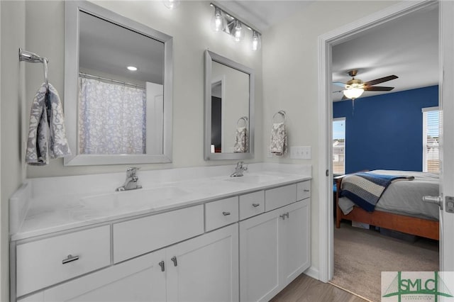 bathroom featuring vanity and ceiling fan