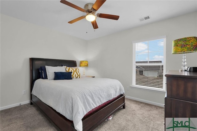 carpeted bedroom featuring ceiling fan