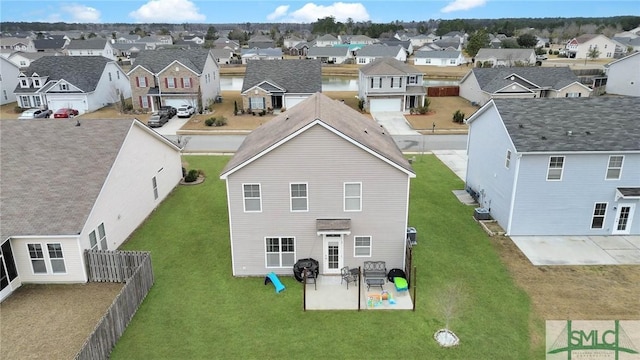 rear view of house featuring a patio area