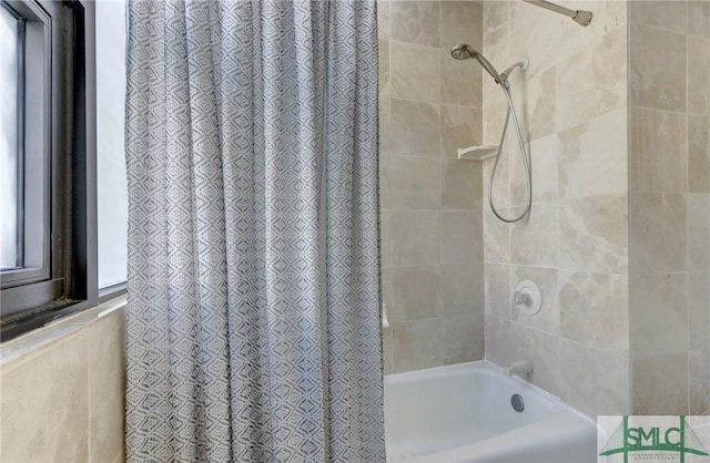 bathroom with shower / bath combo