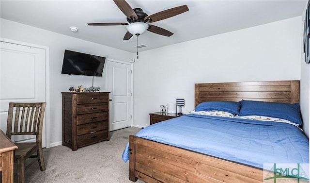 carpeted bedroom featuring ceiling fan