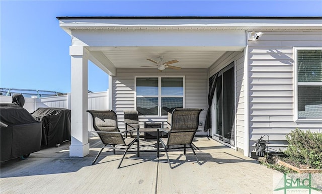 view of patio featuring grilling area and ceiling fan