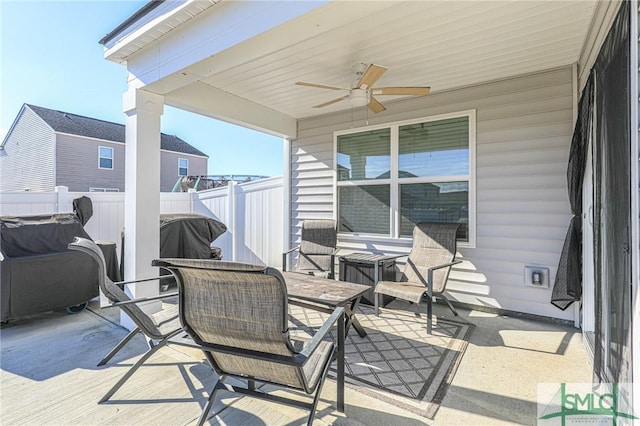 view of patio with ceiling fan