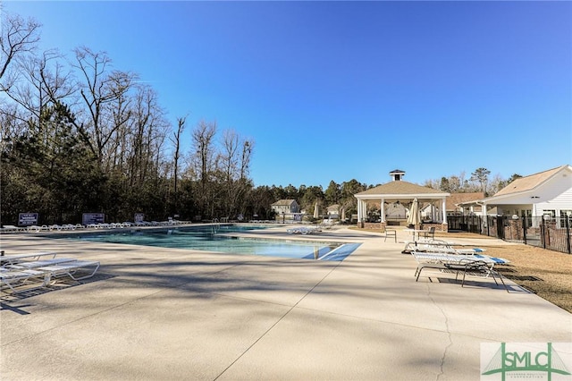 view of swimming pool with a patio area and a gazebo