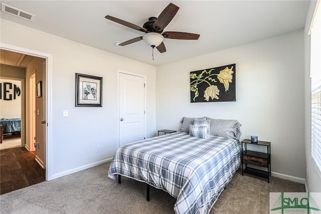 carpeted bedroom featuring ceiling fan