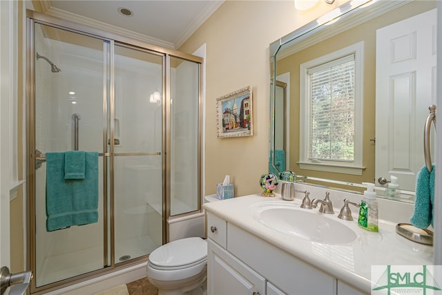 bathroom featuring vanity, toilet, crown molding, and an enclosed shower