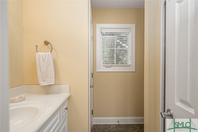 bathroom featuring vanity and tile patterned flooring