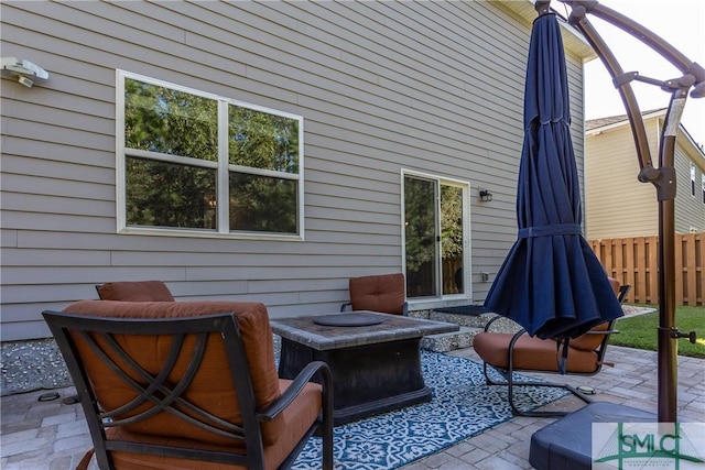 view of patio with an outdoor fire pit