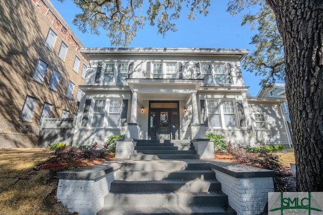 entrance to property featuring french doors