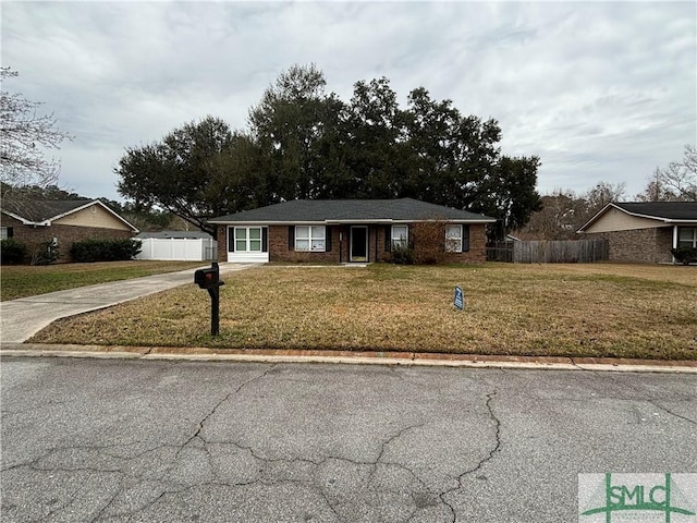 ranch-style house with a front yard