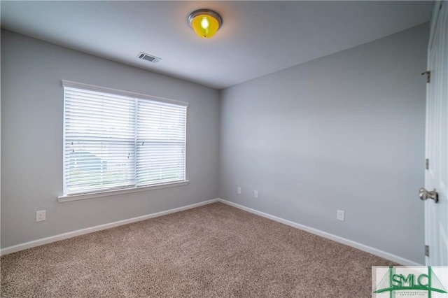 view of carpeted spare room