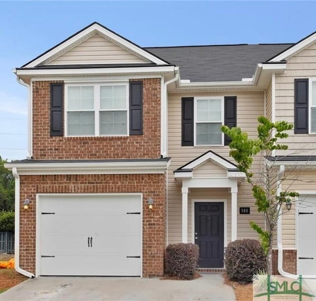 view of front of property with a garage