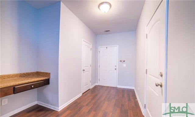 hall featuring dark hardwood / wood-style floors