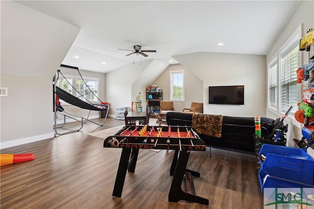 playroom featuring ceiling fan, wood-type flooring, and vaulted ceiling