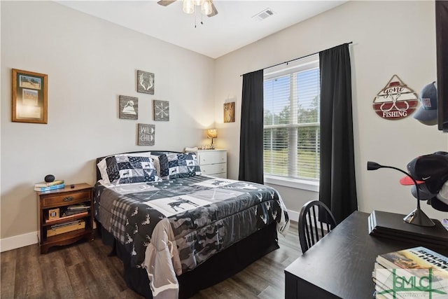 bedroom featuring ceiling fan and dark hardwood / wood-style flooring