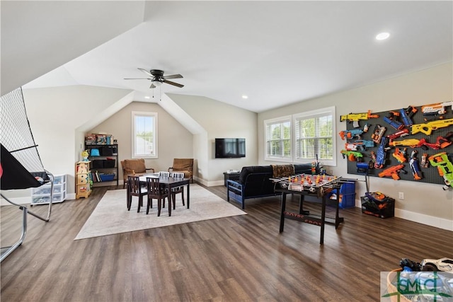 playroom featuring lofted ceiling, recessed lighting, baseboards, and dark wood-style flooring