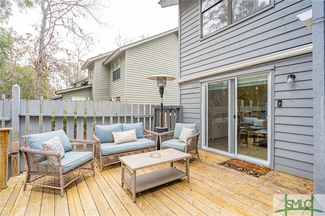 wooden deck featuring an outdoor hangout area