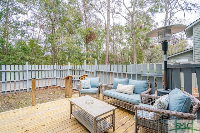 deck featuring an outdoor living space