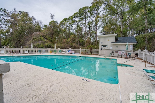 view of swimming pool featuring a patio