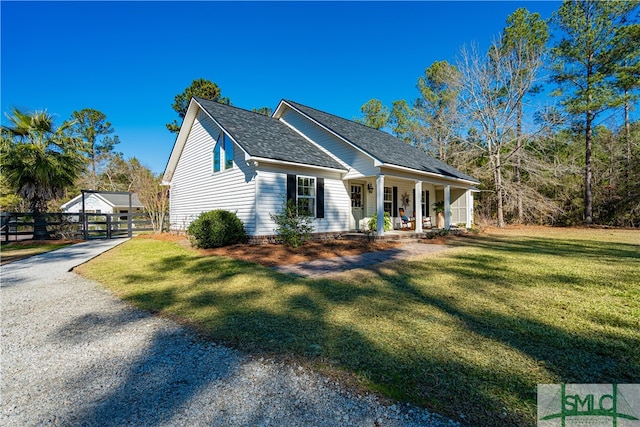 exterior space with a porch and a yard