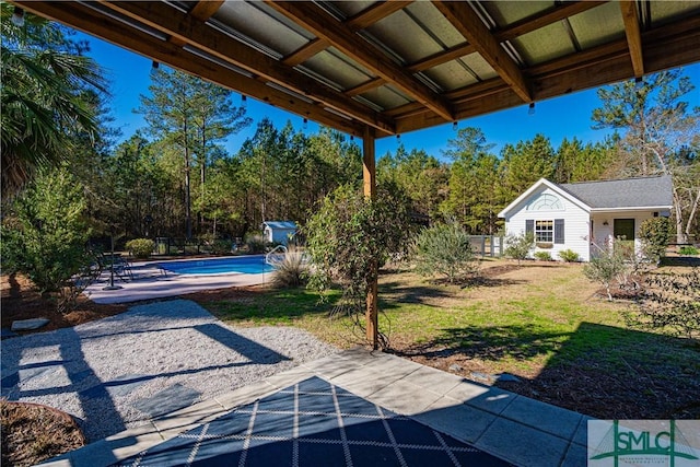 view of patio with an outdoor structure