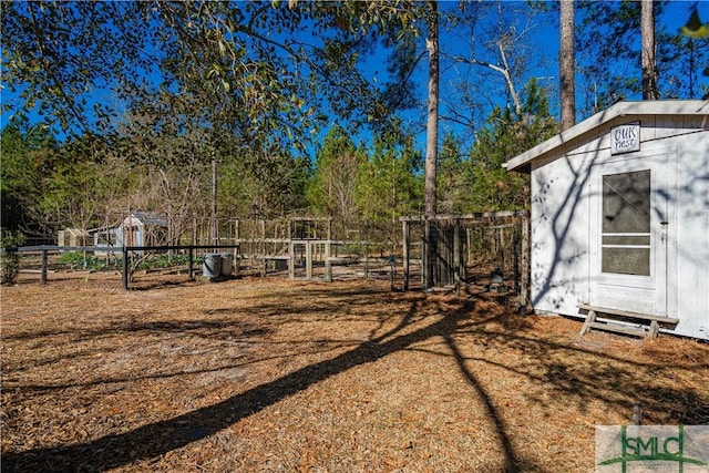 view of yard with a storage unit