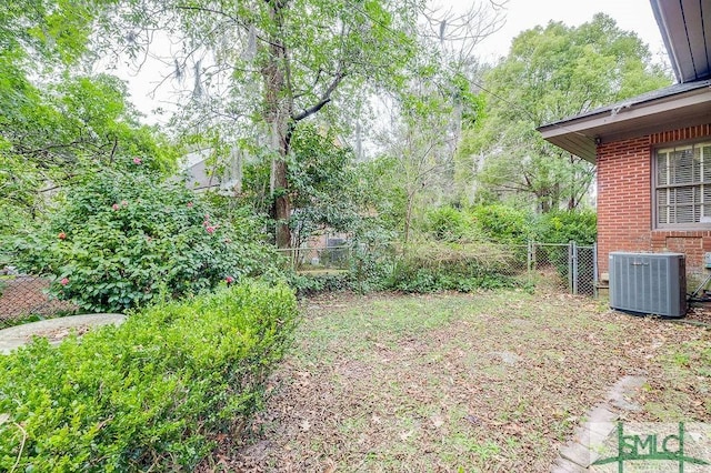 view of yard featuring central AC unit