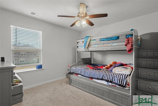 bedroom featuring ceiling fan and light colored carpet