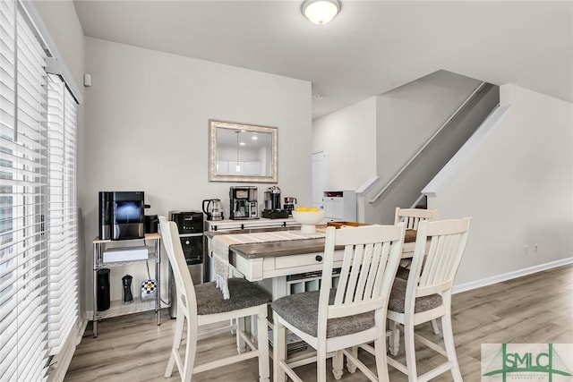 dining room featuring light wood-type flooring