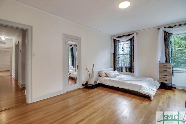 bedroom featuring hardwood / wood-style floors