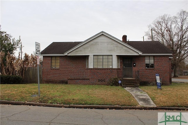 view of front of house with a front yard