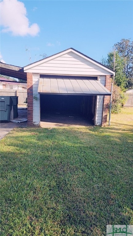 garage with a lawn