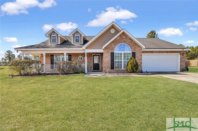 view of front of home with a garage, covered porch, and a front lawn