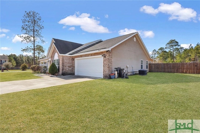 view of side of home with a garage, central AC unit, and a lawn