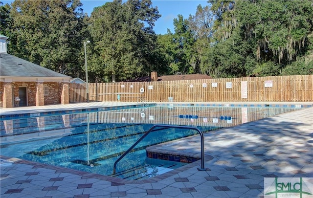 view of pool with a patio area