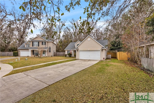 view of front of home featuring a garage and a front lawn