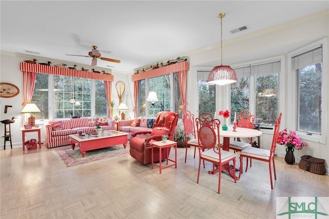 sunroom with ceiling fan