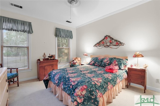 bedroom featuring crown molding, ceiling fan, light colored carpet, and multiple windows