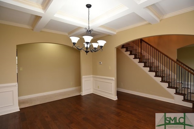 interior space with crown molding, dark hardwood / wood-style floors, and beam ceiling