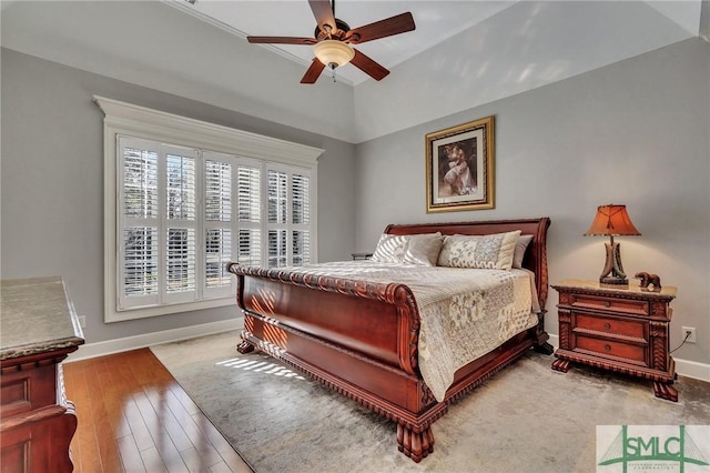 bedroom featuring ceiling fan and light hardwood / wood-style flooring