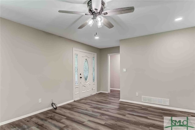 foyer featuring ceiling fan and dark hardwood / wood-style floors