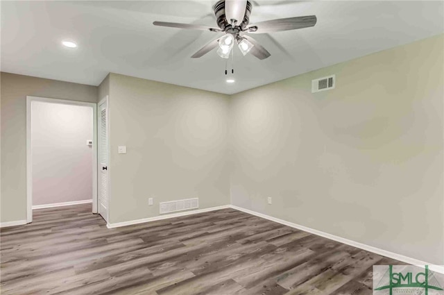 unfurnished room featuring hardwood / wood-style flooring and ceiling fan