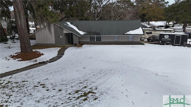 view of snow covered property