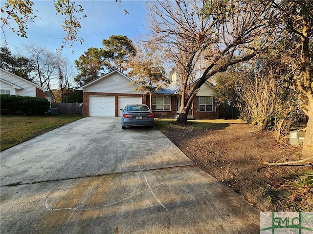 single story home with a garage