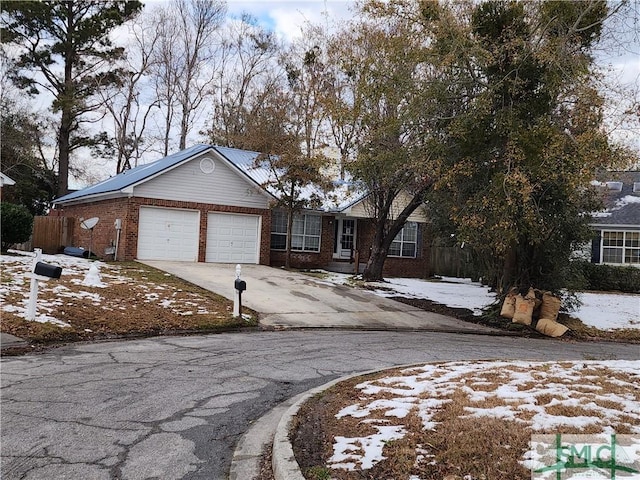 view of front of home featuring a garage