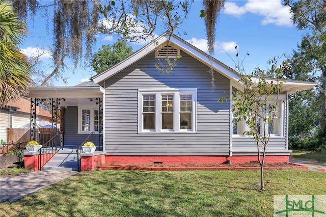 exterior space with a yard and covered porch