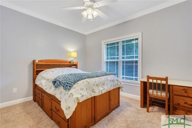 carpeted bedroom with crown molding and ceiling fan