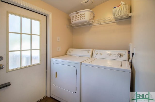 washroom with washer and clothes dryer