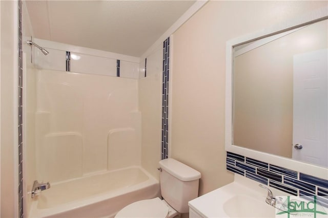 full bathroom featuring vanity, backsplash, toilet, and shower / bath combination