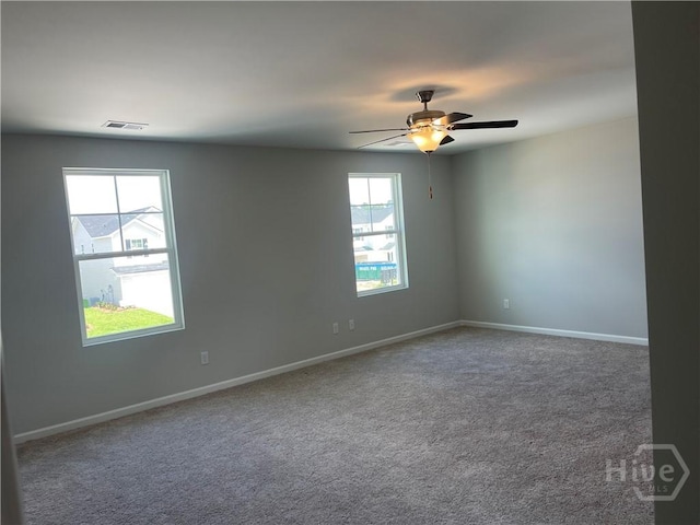 82 Marsh Salt Ln, Port Wentworth, GA 31407 - carpeted spare room featuring baseboards and a ceiling fan